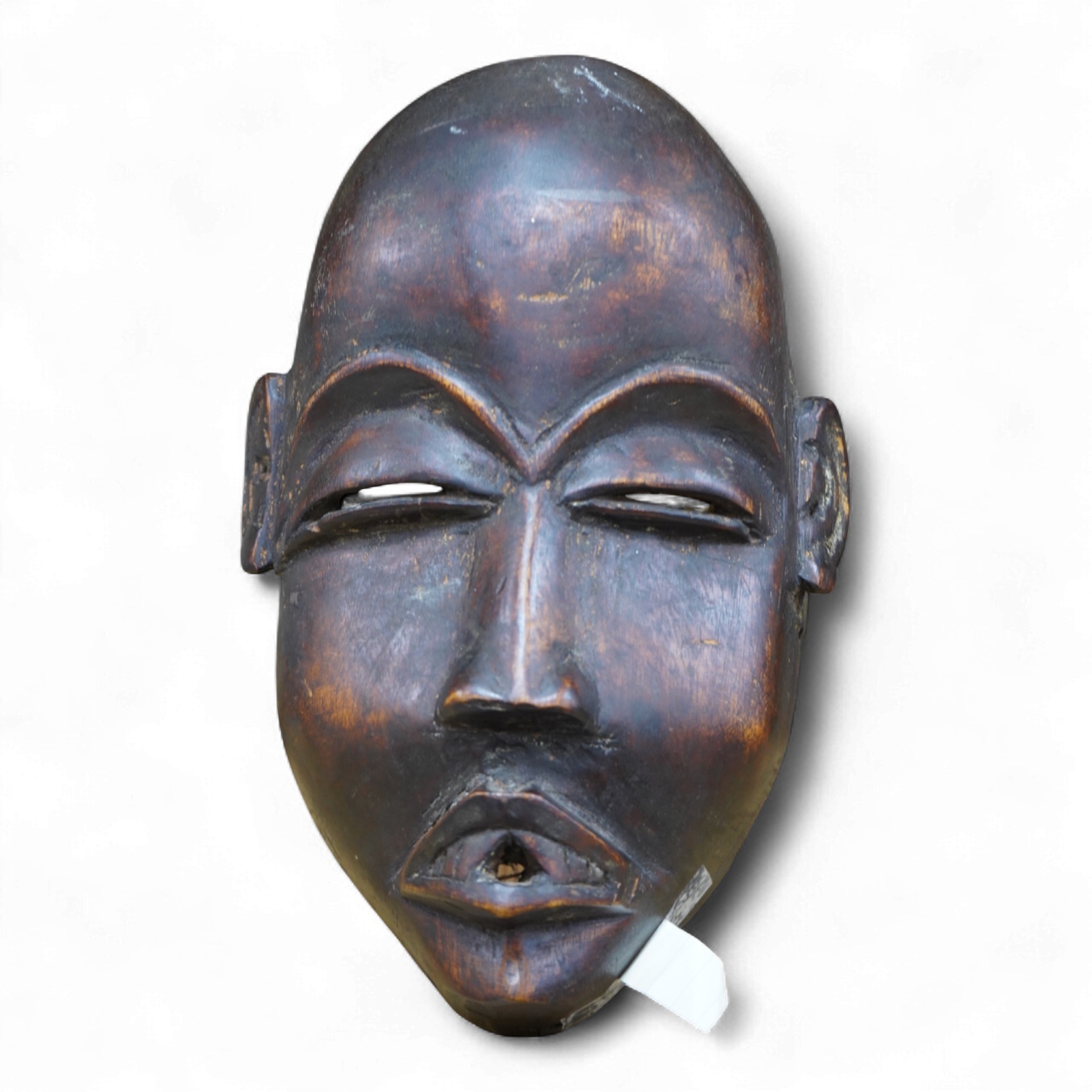 An African Guro tribe hardwood mask, 27cm high